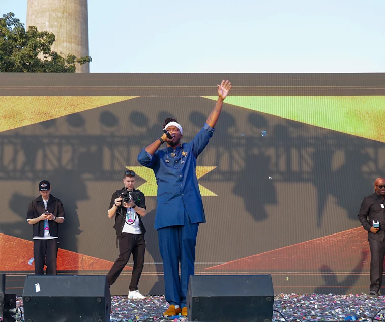 Popular reality show singers performing live at a concert event