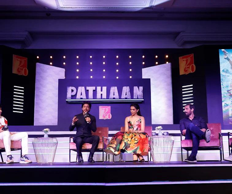 Bollywood celebrity performing at a live event organized by an event management company